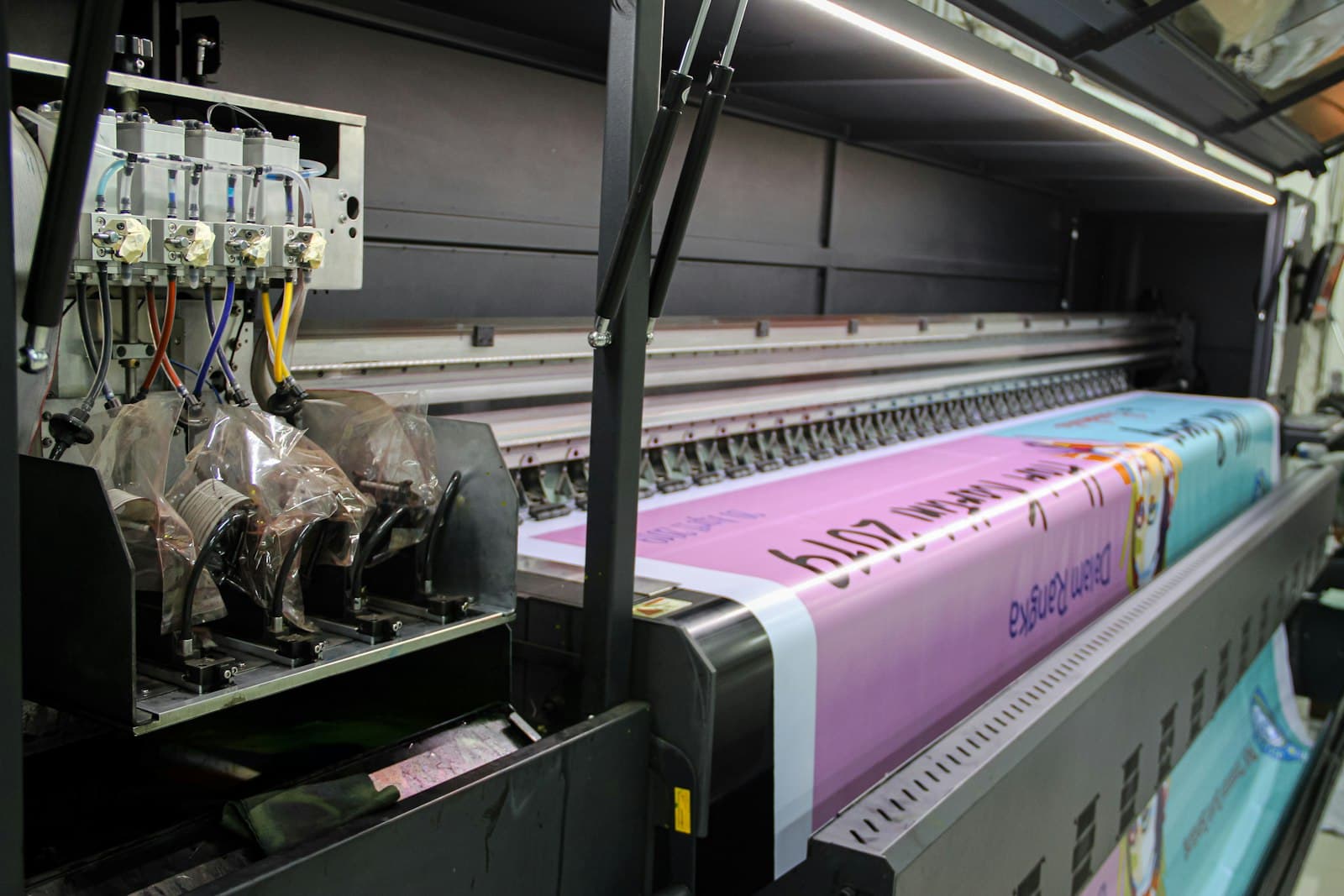 Large-format flex printer running a banner job